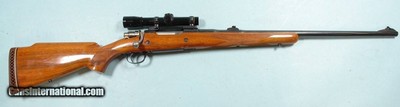BELGIAN BROWNING 32494- FN MAUSER MAGNUM BOLT ACTION .458 WIN. MAG. CAL. RIFLE MFG. 1970 WITH LEUPOLD M8 CROSSHAIR 2.5X SCOPE.