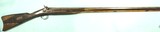 32429-IRISH PERCUSSION 10 BORE DAMASCUS SINGLE FOWLER SIGNED TUMBLTY W/ORNATE AFRICAN DECORATION CIRCA MID TO LATE 1800’S.