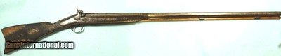 32429-IRISH PERCUSSION 10 BORE DAMASCUS SINGLE FOWLER SIGNED TUMBLTY W/ORNATE AFRICAN DECORATION CIRCA MID TO LATE 1800’S.