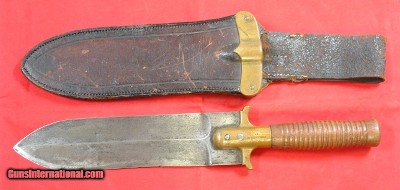 32756-INDIAN WARS 3RD U.S. INFANTRY MARKED SPRINGFIELD U.S. 1880 HUNTING KNIFE WITH RARE BRASS GUARD AND 1ST TYPE SCABBARD.