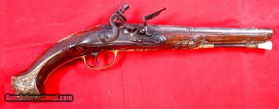 32718-ORNATE MASTERPIECE CLAUDE NIQUET OF LIEGE FLINTLOCK HOLSTER PISTOL CIRCA MID 1700’S.