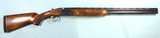 32861- SKB 500 20 GAUGE SHOTGUN WITH 26” BARREL WITH MOTOR CASE MADE IN JAPAN. - 1 of 7