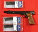 SMITH AND WESSON S&W MOD. 41 MODEL 41 TARGET PISTOL IN .22 LR WITH 7” BARREL ORIGINAL MUZZLE BREAK AND 3 EXTRA MAGS. - 1 of 6