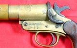 BRITISH WW1 WWI CANADIAN ROYAL ARTILLERY REGIMENT WEBLEY & SCOTT BRASS VERY FLARE OR SIGNAL PISTOL ENGRAVED “YPRES” AND WITH REGIMENTAL COAT OF ARMS. - 2 of 4 BRITISH WW1 WWI CANADIAN ROYAL ARTILLERY REGIMENT WEBLEY & SCOTT BRASS VERY FLARE OR SIGNAL PISTOL ENGRAVED “YPRES” AND WITH REGIMENTAL COAT OF ARMS. - 2 of 4