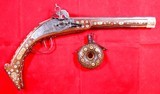 ORIGINAL GERMAN WHEELLOCK OR WHEELOCK BONE INLAID DONUT PISTOL POWDER FLASK CIRCA 1575-1590’S.
