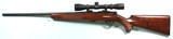 ANCHUTZ MODEL 1710 BOLT ACTION .22LR RIFLE W/ SCOPE.