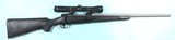WINCHESTER MODEL 70 6.5 CREEDMOOR BOLT ACTION SYNTHETIC STAINLESS RIFLE WITH SCOPE.