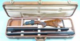 FACTORY ENGRAVED GOLD INLAID REMINGTON MODEL 32 TF O/U 12 GA. 2 3/4” TRAP SHOTGUN 2 BARREL SET CA. 1947 W/CASE.
