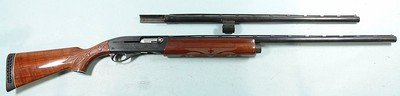 REMINGTON MODEL 1100 MAGNUM 12 GAUGE WITH 2 BARRELS.