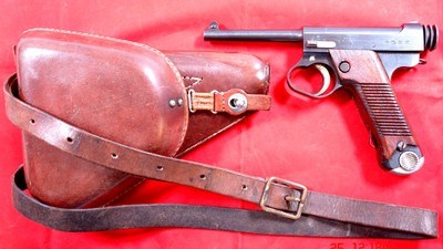 NEAR MINT WW2 JAPANESE TYPE 14 8MM NAMBU PISTOL W/ORIGINAL HOLSTER AND STRAPS.