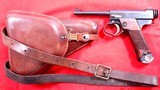 NEAR MINT WW2 JAPANESE TYPE 14 8MM NAMBU PISTOL W/ORIGINAL HOLSTER AND STRAPS. - Image 1 of 8
