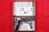 COLT U.S. MODEL 1911A1 1911 WW2 WWII PACIFIC THEATER OF OPERATIONS COMMEMORATIVE 25TH ANNIVERSARY NICKEL .45 ACP CAL. PISTOL. - Image 1 of 3