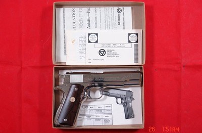 COLT U.S. MODEL 1911A1 1911 WW2 WWII PACIFIC THEATER OF OPERATIONS COMMEMORATIVE 25TH ANNIVERSARY NICKEL .45 ACP CAL. PISTOL. - Image 1 of 3