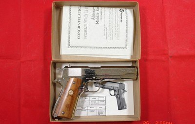 COLT U.S. MODEL 1911 A1 WW2 WWII EUROPEAN THEATER OF OPERATIONS COMMEMORATIVE 25TH ANNIVERSARY NICKEL .45 ACP CAL. PISTOL. - Image 1 of 3