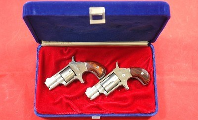 PAIR OF NAA NORTH AMERICAN ARMS CORP. DERRINGERS OR DERINGER 'S IN .22LR AND .22 SHORT IN CASE. - Image 1 of 4