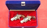 PAIR OF NAA NORTH AMERICAN ARMS CORP. DERRINGERS OR DERINGER 'S IN .22LR AND .22 SHORT IN CASE. - Image 1 of 4