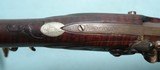 KEITH CASTEEL RAISED CARVED & SILVER INLAID FLINTLOCK LONGRIFLE DATED MAY 1971. - Image 7 of 14