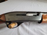 REMINGTON 1100 12ga. with extra slug barrel and sling - 1 of 14