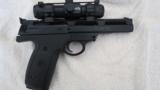 Smith and Wesson 22A 5.5" barrel w/ red dot scope - 2 of 5