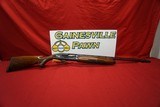 Engraved Remington Model 1100 in 20ga - 1 of 12