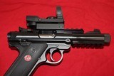 Ruger Mark 4
Tactical with extras 22 - 10 of 13