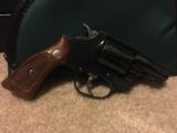 Smith and Wesson Model 31-1 (2 inch barrel, blue, wood grips) - 2 of 5