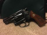 Smith and Wesson Model 31-1 (2 inch barrel, blue, wood grips) - 1 of 5