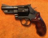 Smith and Wesson 29-3 (2 1/2 inch barrel, pres. grips)
- 1 of 7