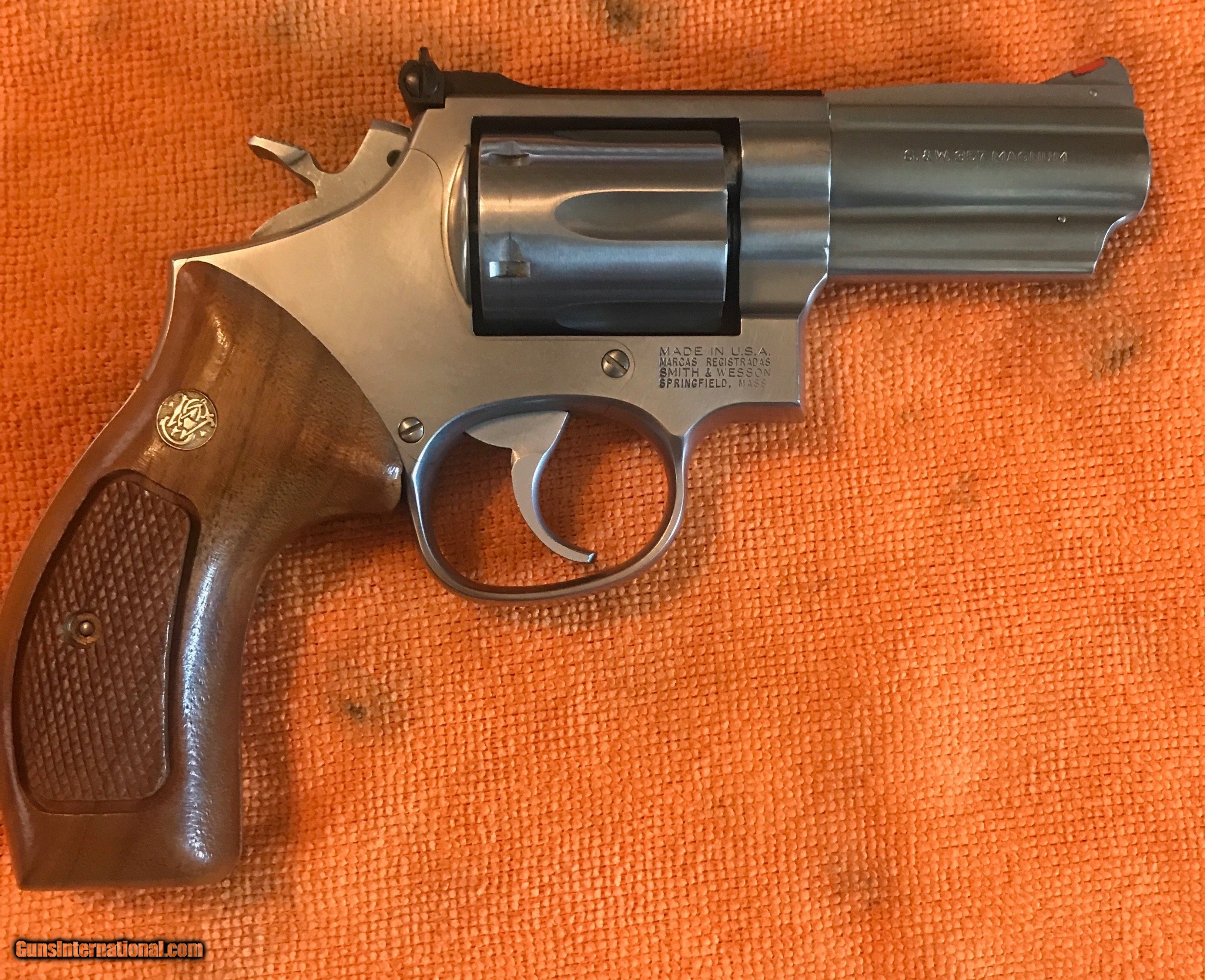 Smith and Wesson 66-3 (3 inch, stainless, smooth combat stocks)