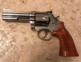 Smith and Wesson 586 (nickel, 4 inch) - 1 of 9
