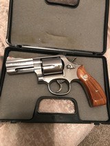 Smith and Wesson 696-1 (3 inch, stainless, wood grips) - 1 of 6