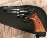 Smith and Wesson 25-5 (4 in, pinned, targets) - 1 of 6