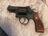 Smith and Wesson 19-5 (2 in, blue, wood grips) - 1 of 8