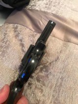 Smith and Wesson 19-5 (2 in, blue, wood grips) - 5 of 8