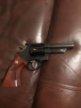 Smith and Wesson 57 (4 in, blue, millet sights) - 1 of 6