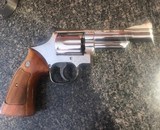 Smith and Wesson 19-4 (4 in, nick, targets) - 1 of 7