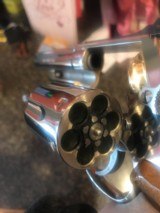 Smith and Wesson 19-4 (4 in, nick, targets) - 5 of 7