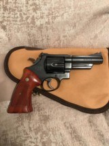 Smith and Wesson 29-3 (4in, blue, targets) - 1 of 5
