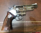 Smith and Wesson 29-2 (4 in, nickel, p and r) - 1 of 2