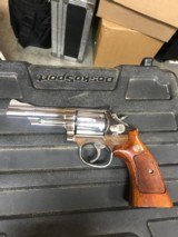 Smith and Wesson 19-5 (4 in, nickel, targets) - 2 of 5
