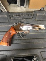 Smith and Wesson 19-5 (4 in, nickel, targets) - 1 of 5