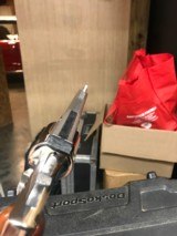 Smith and Wesson 19-5 (4 in, nickel, targets) - 3 of 5