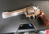 Smith and Wesson 686 (6 in, stainless, targets) - 1 of 6