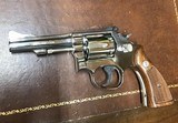 Smith and Wesson 15-4 (4 in, nickel) - 1 of 7