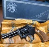 Smith and Wesson 15-2 (4 in, blue, box) - 1 of 8