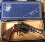 Smith and Wesson 19-4 (4 in, blue, box) - 1 of 8