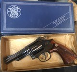 Smith and Wesson 19-4 (4 in, blue, box) - 2 of 8