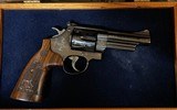 Smith and Wesson 29-10 (4 inch, engraved, box) - 2 of 8