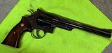 Smith and Wesson 57 (8 3/8ths, blue, targets) - 1 of 6