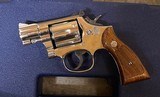 Smith and Wesson 15-4 (1 7/8ths, nickel) - 1 of 6